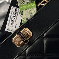Badgley Mischka black quilted tote.