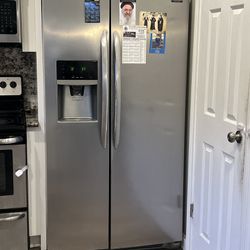 Frigidaire Side By Side Stainless Steel Fridge. Great condition  for just $275