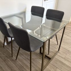 Glass kitchen table And chairs 