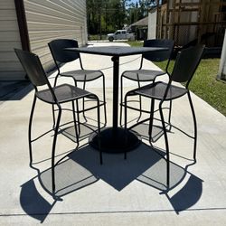 Metal High Top 41 Inch Height.    And 4 Metal Chairs