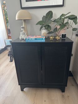 MOVING SALE! Black Rattan Cabinet