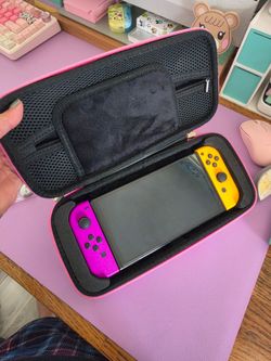 OLED switch with colored joycons
