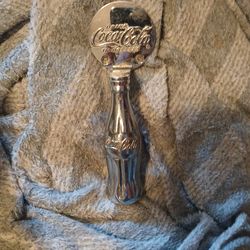 Coca-Cola bottle opener/door pull