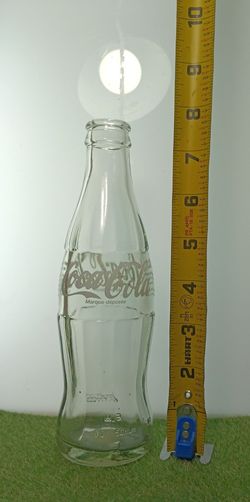 Coca cola glass bottle made in Switzerland
