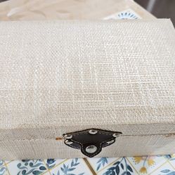 Barely use, shimmering fabric covered with velvet interior accessories jewelry container.