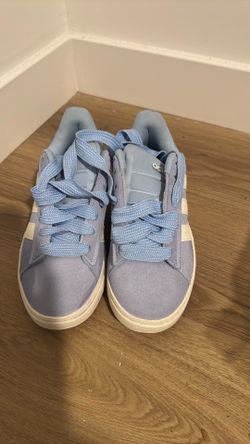 Light blue Adidas ( size 7 )
