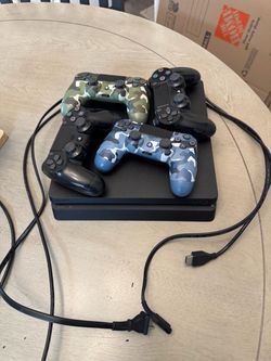 Sony PS4 Slim Console with 4 Controllers