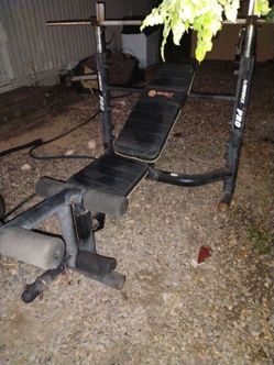 Marcy pro weight bench with weights 2 dum bell 2 curl bars and weight $200