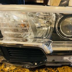 Toyota Tacoma Left Headlight - OEM