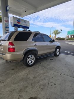 2003 Accura MDX
Automatic 
runs very good 
NO ISUES
HAND Clean title
TAGS 03/27
AC WORK
Motor    V6
VERY GOOD TIRES
4 WD
Seat no ript very clean
ac su