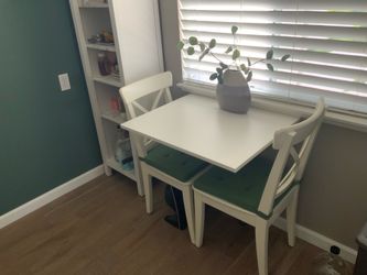 White IKEA drop-down, wall-mount small table and chairs set