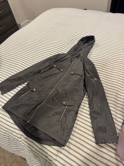 Pretty women’s medium Michael Kors rain jacket