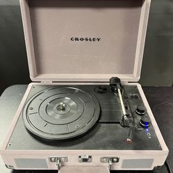 Crosley Cruiser Plus Record Player with Bluetooth Receiver. Built in stereo speakers. 3 speeds, adjustable pitch control, aux-in, and a cueing lever.