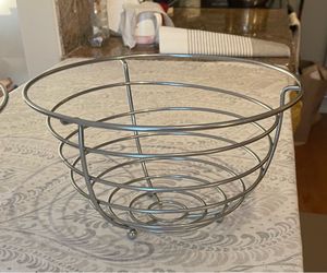 Two metal fruit basket.