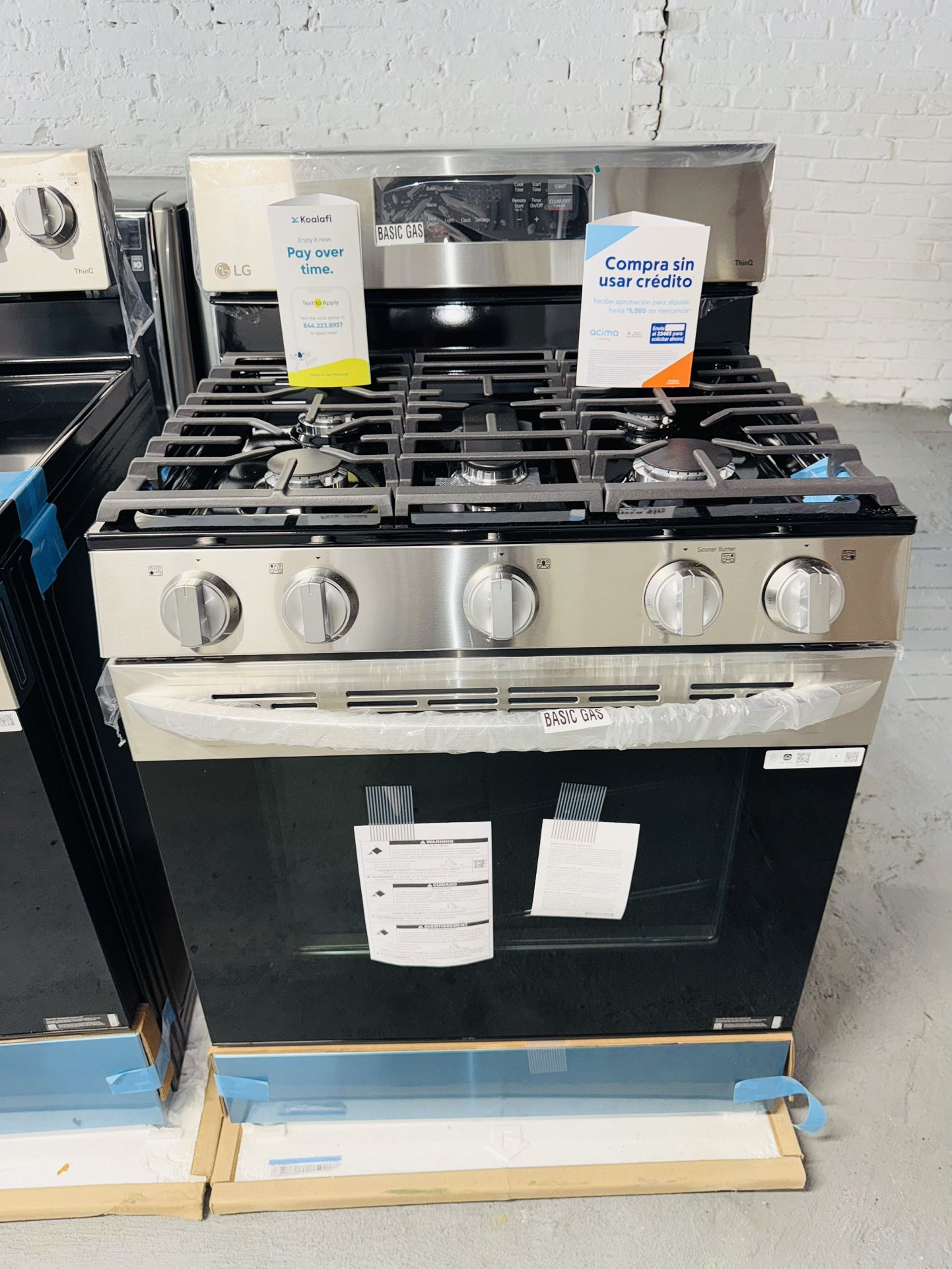 This new LG gas stove comes with a one-year warranty. We also have financing available for up to six months.