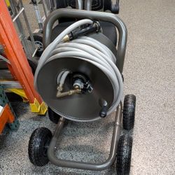 ELEY  4 Wheel Garden Hose Reel Cart.  CAN BE USED AS TWO-WHEEL OR FOUR-WHEEL HAS BOTH OPTIONS. 