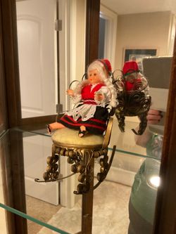 Vintage doll on chair