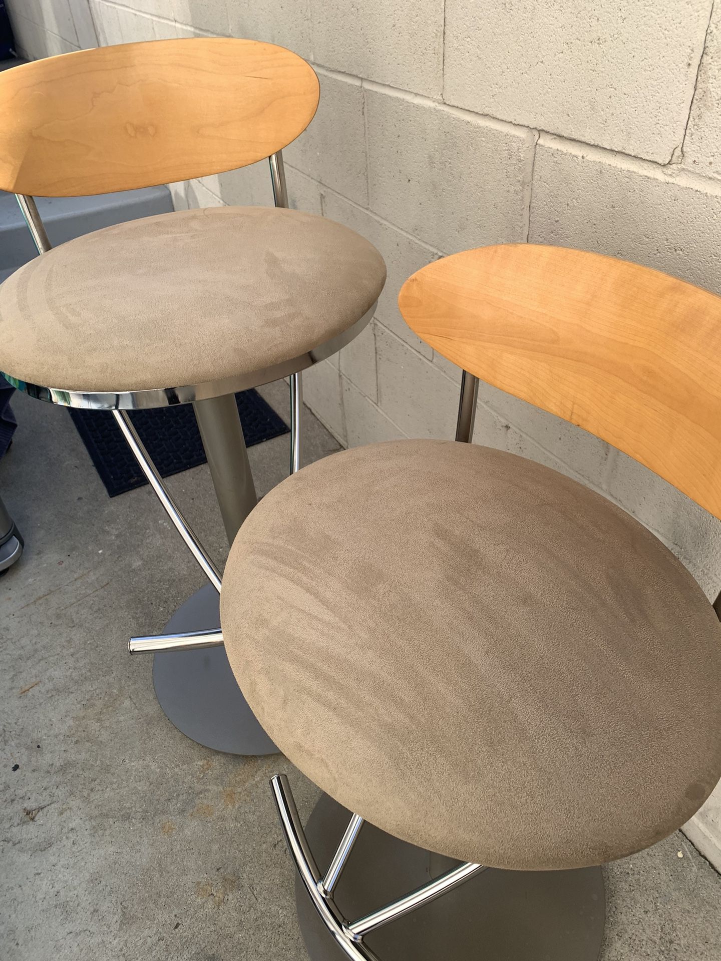 Great Condition (2) Barstools With Chrome Base With Foot Rest Padded Seat And Wooden Back Rest Also Swivels And Adjust.
