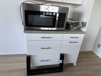 New GE Over the range Microwave