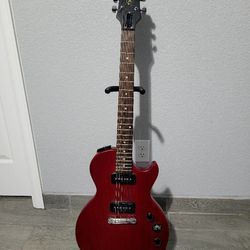 $220    2 Guitars 