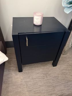 Two black nightstands