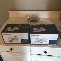 Pair of glacier Bay bathroom faucets