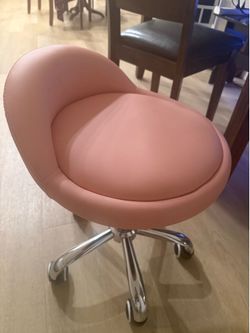 Pink rolling stool