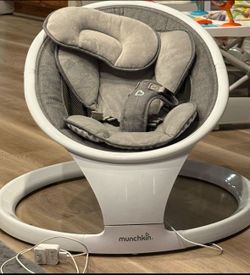 Munchkin baby swing