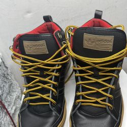 These are Adidas Chasker boots in black and red.