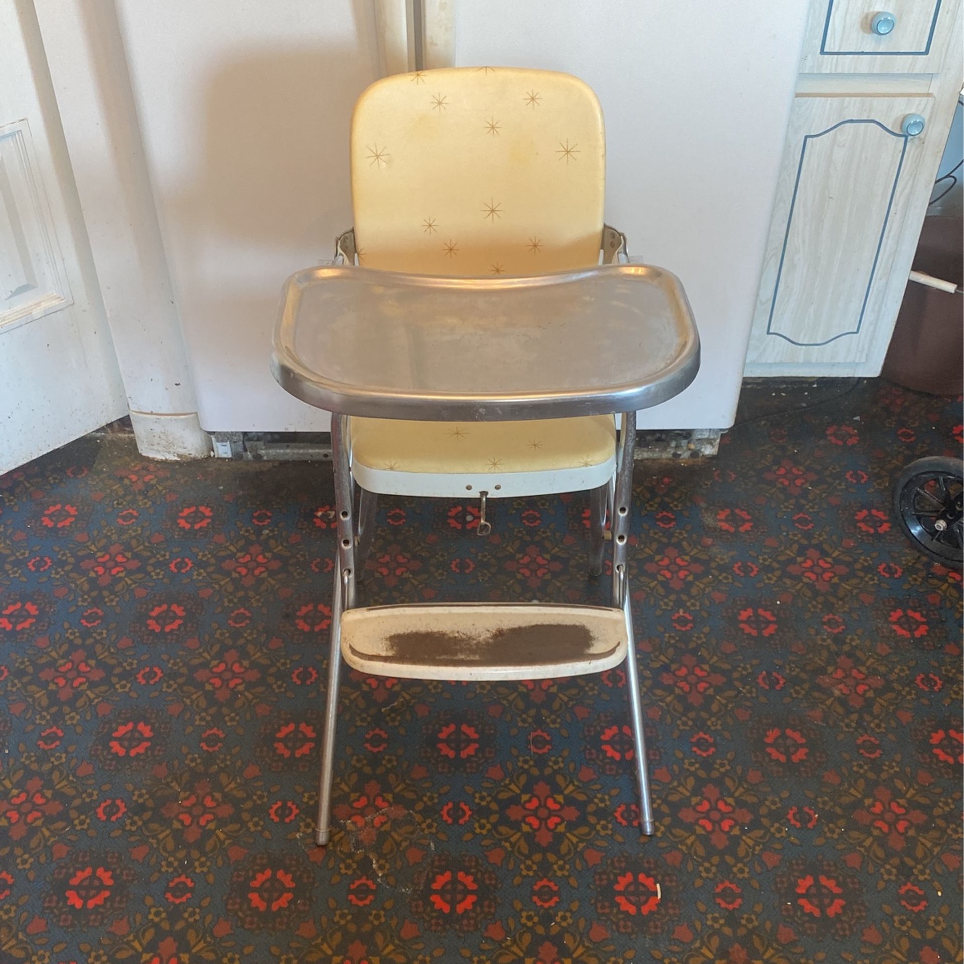 Vintage Cosco high chair.