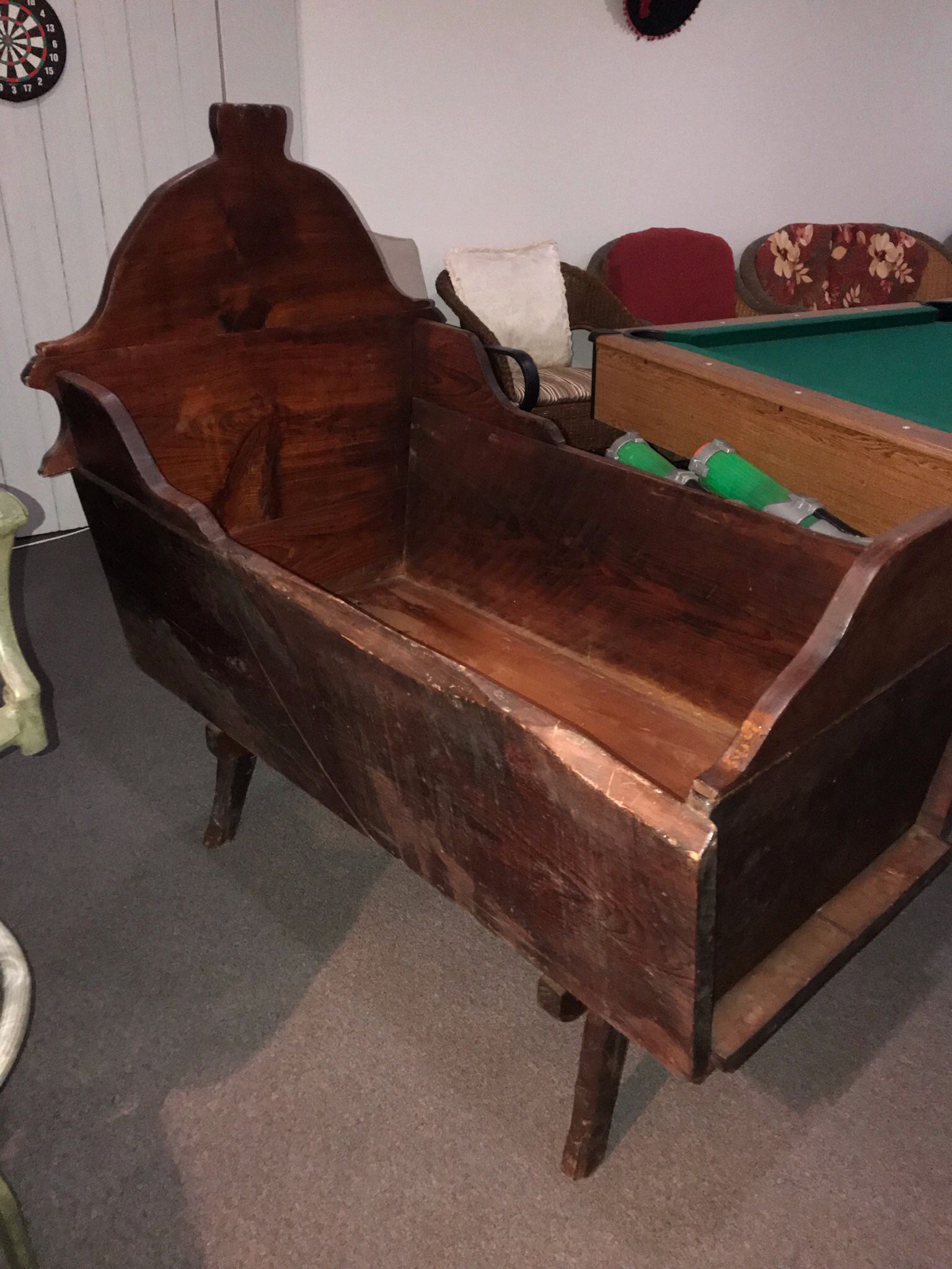 Hand carved solid wood antique cradle with mattress and bedding