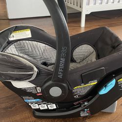 INFANT CAR SEAT, BASE, A SECOND BASE AND STROLLER ATTACHMENT ALL INCLUDED BUT NOT PICTURED