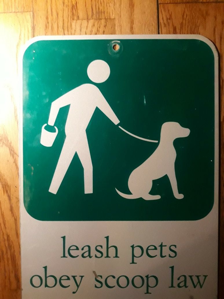 Leash Pets Metal Sign