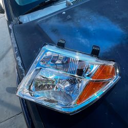 Driver side Nissan frontier/Pathfinder  headlights assembly New