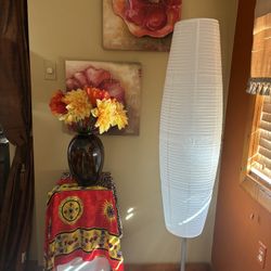 Lamp and corner two canvas, pictures, vase with nine big crêpe flowers, and design scarf to match