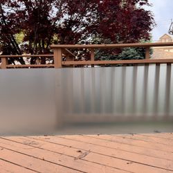 Large frosted glass panel with mounting holes
