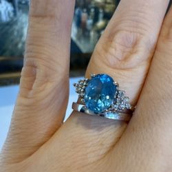 10K White Gold Blue Topaz And Diamonds ring 