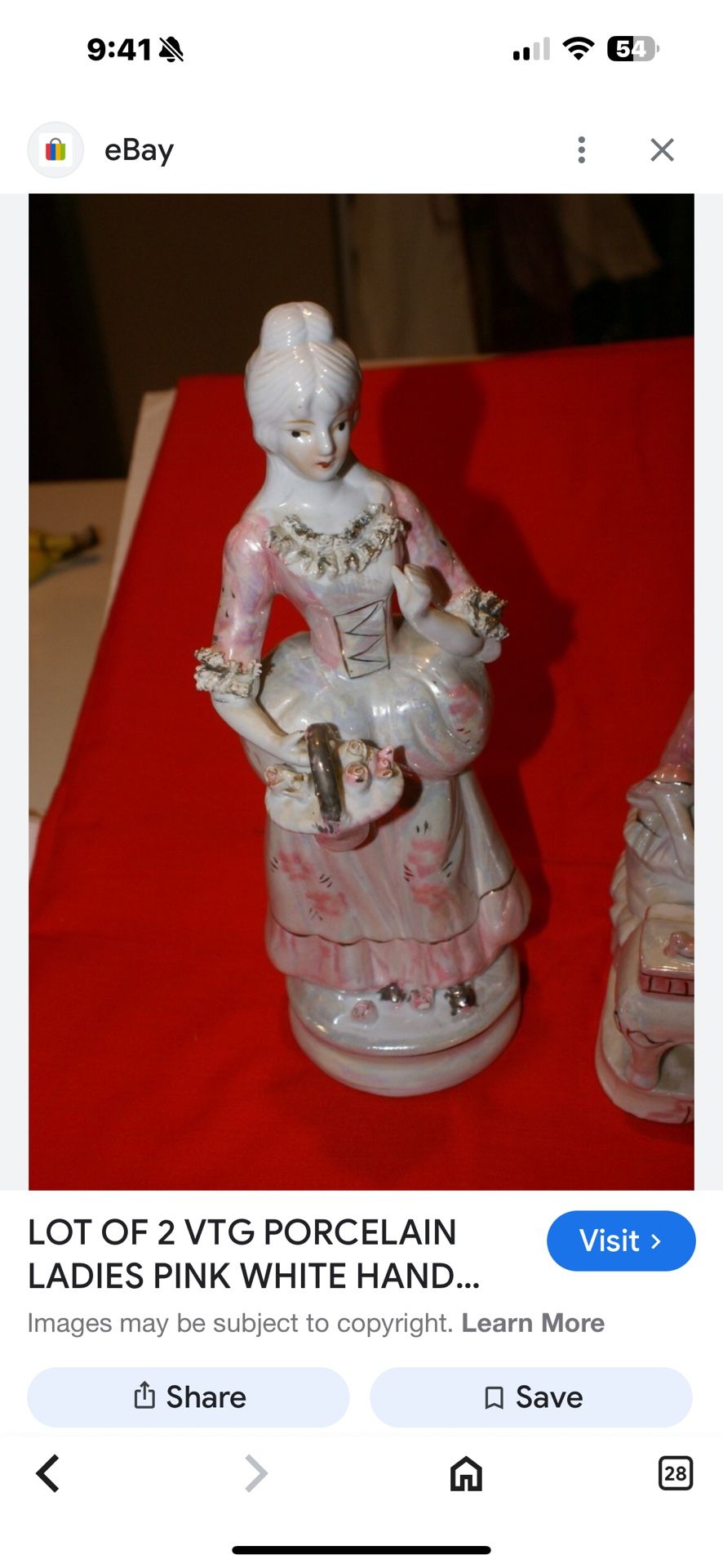 Victorian porcelain lady statue about 8 inches tall, golden pink