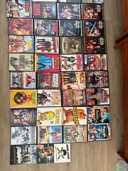 Large Lot of DVDs/VHS Mixed Titles + DVD/VHS player