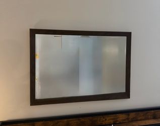 Wood framed wall mirror