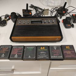 Vintage Atari System With 3 Joysticks And 4 Car Controller