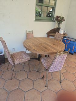 Vintage round dining table with 4 chairs