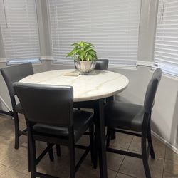 Table And 4 Chairs