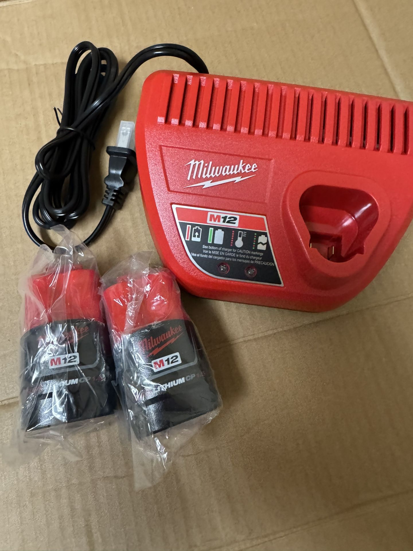 Milwaukee Batteries And Charger M12