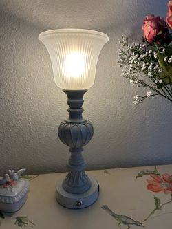 Dimmable lamp with charger station