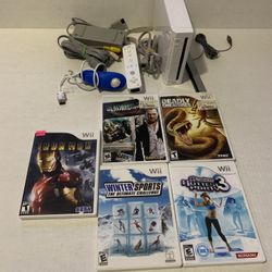 nintendo wii + 5 games 