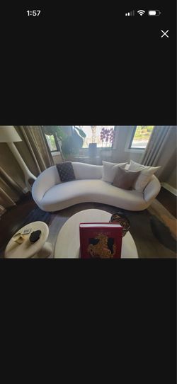 Like new CB2 couch has not been sat on.
