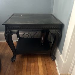 Black and brown night stands with lamp