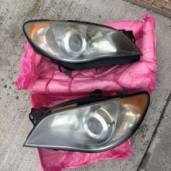 2006 Hawkeye OEM headlights 