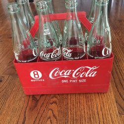 Vintage 8 Glass Coca Cola Glass Pint Bottles in Imperfect Red Plastic Carrier